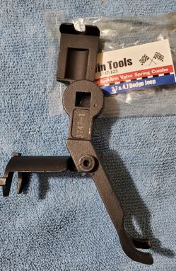 Rocker arm valve spring compressor