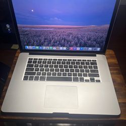 2015 MACBOOK PRO 15 INCH 16GB QUAD CORE INTEL I7, 512GB SOLID STATE DRIVE BATTERY COUNT 72