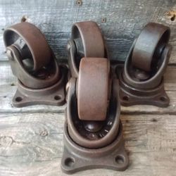 Set Of Four Cast Iron Caster Wheels Rollers Industrial Salvage Steampunk 