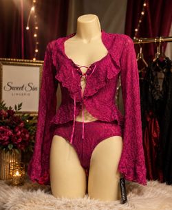 Elegant Lace Lingerie Set  Discover timeless elegance with this stunning lace lingerie set in a rich fuchsia shade. Designed with delicate floral lace