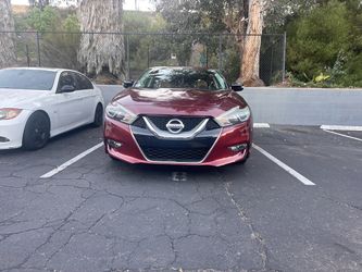 Nissan Maxima Sedan – Red