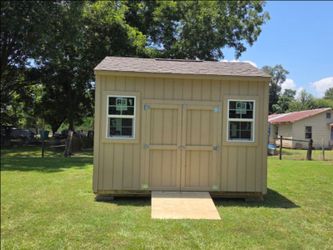 Outdoor Storage Shed with Windows and Ramp