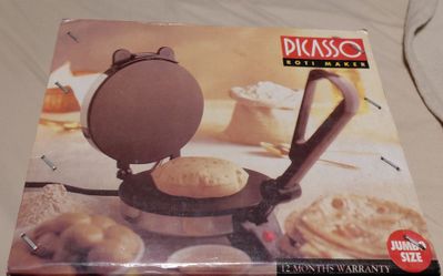 Brand new  roti/ chapti maker in box ( never used)