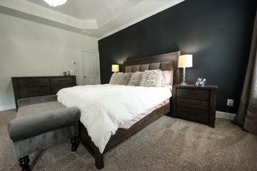 King size bed with headboard and two nightstands