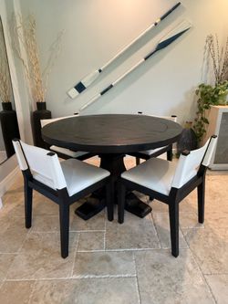 Restoration Hardware dining set, Saddle Fabric Dining Side Chairs. RH. White seat with black oak.SALVAGED WOOD TRESTLE ROUND.