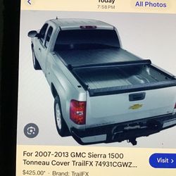 Black Bed Cover For A GMC 2009 Truck Bed