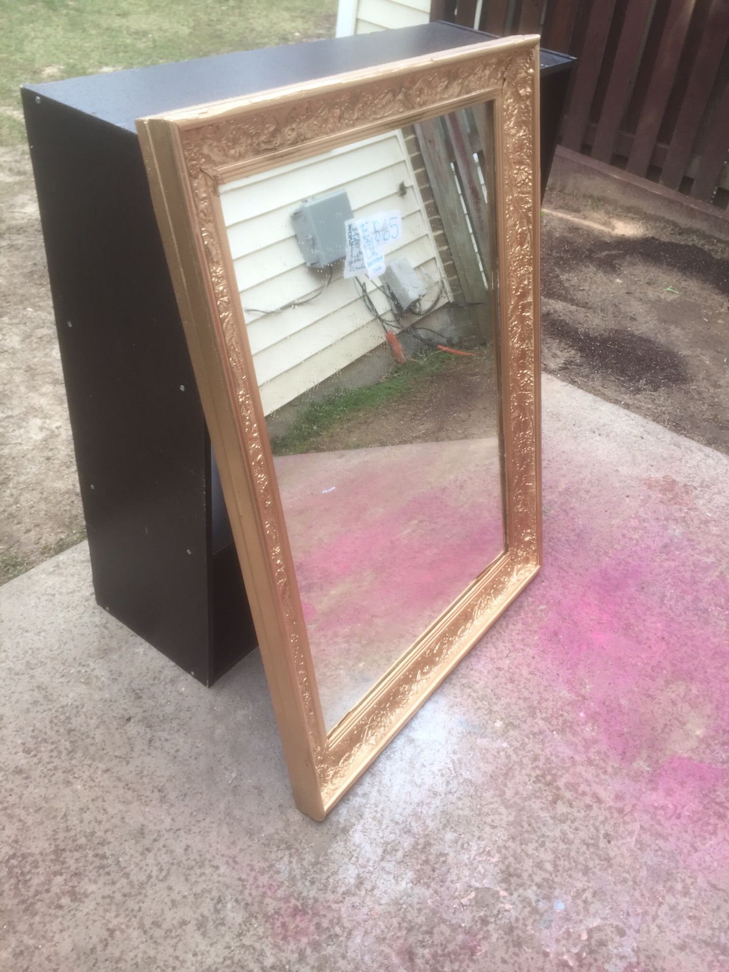 Beautiful and freshly painted gold wall mirror