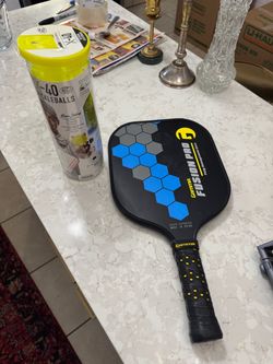 Pickle ball racket and balls brand new
