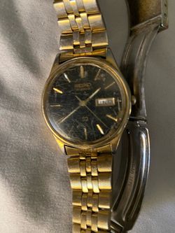 vintage Seiko SQ (Seiko Quartz) day-date dress watch, likely from the late 1980s or early 1990s.