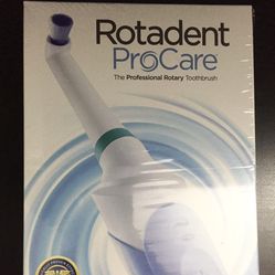 *NEW* Rotadent Procare (Newest Model) Electric Toothbrush. Includes Charger Base And Handle. Does Not Include Brush Heads 