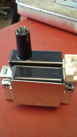 Ignition coil for Hondas. Inside distributors.