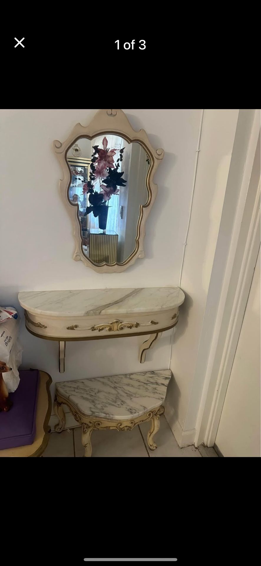 Vintage French provincial, 2 piece wood and marble set. Absolutely gorgeous Mirror with piece to hang on the wall underneath with a heavy marble top.