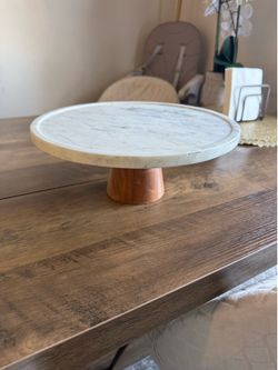 Marble and wood cake stand. Selling for $10