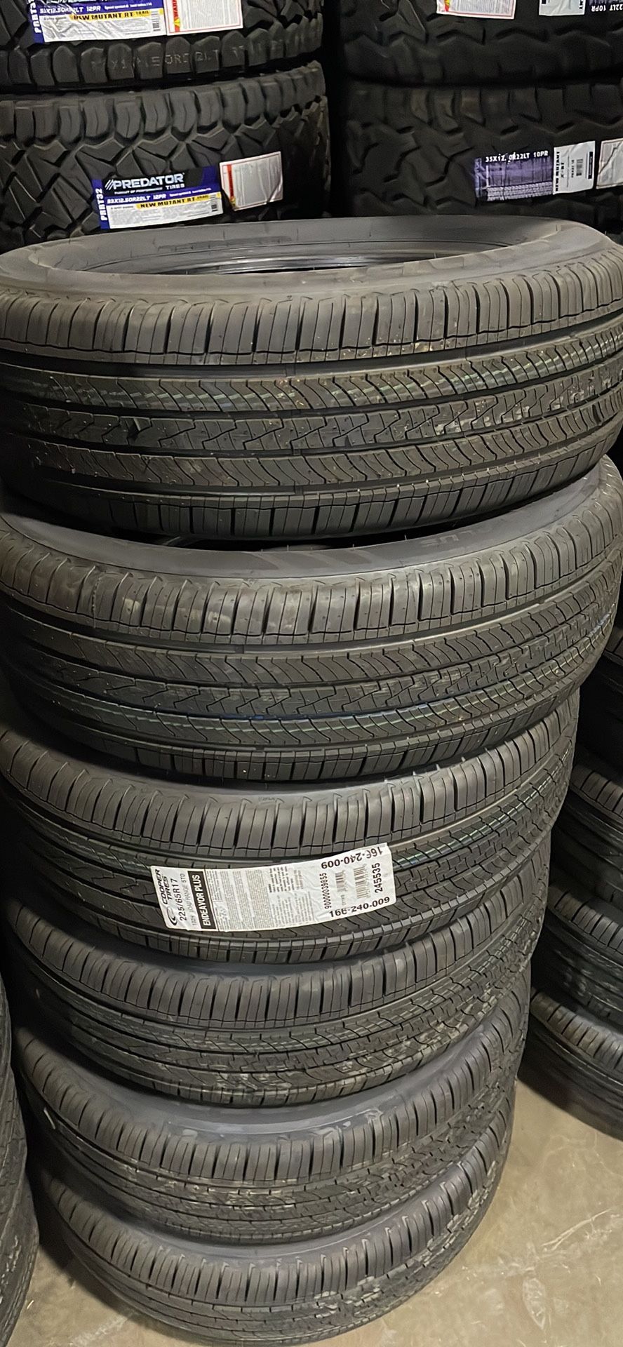 225-65-17 COOPER Endeavor plus All Season Tires installed (4) New 65,000 Mile Warranty-We Finance