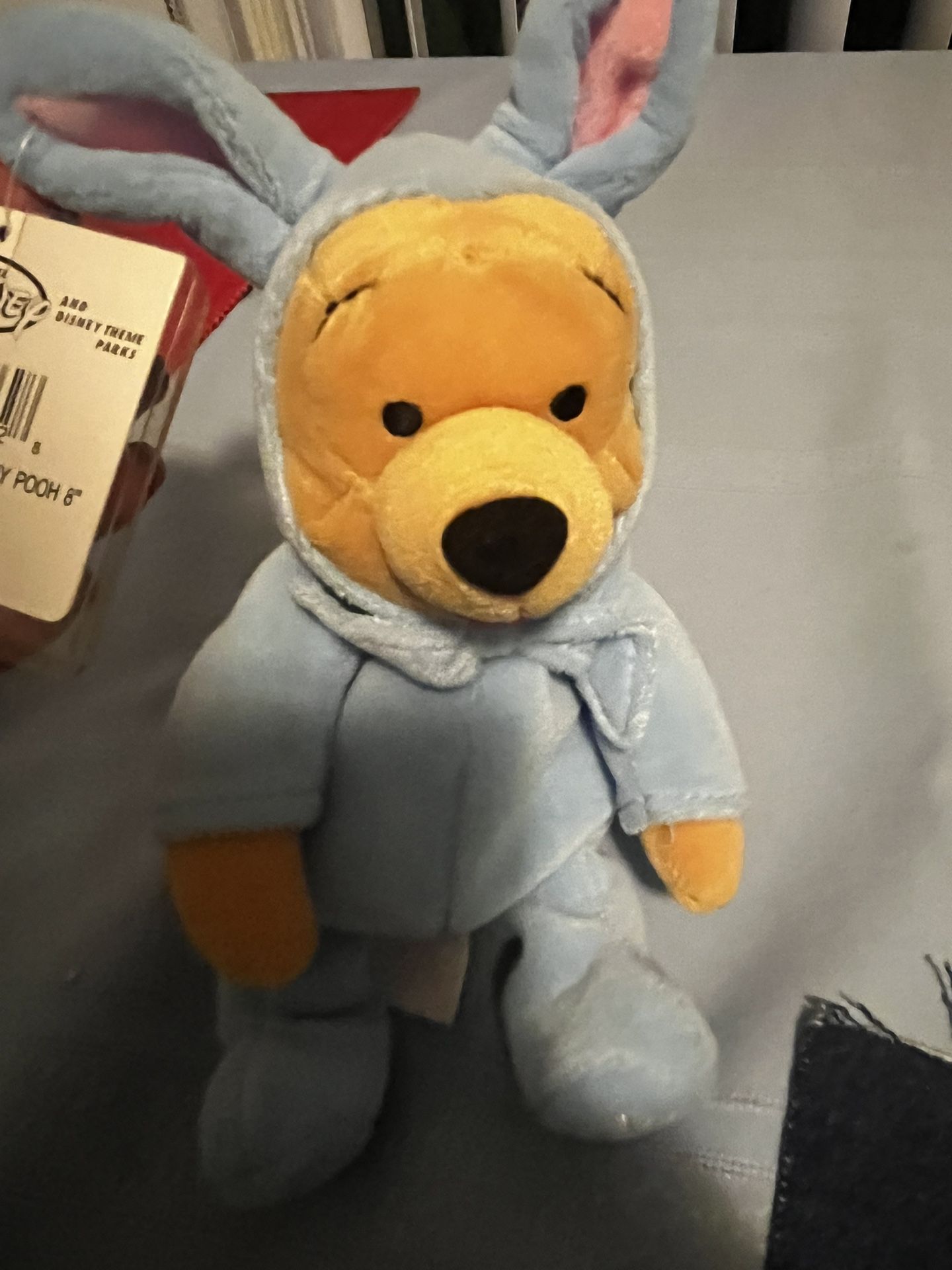 Winnie The Pooh Dressed As Blue Bunny.