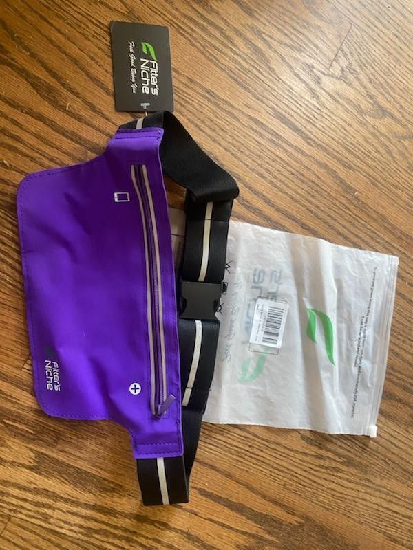 Never used purple Fanny pack. Great for runners 