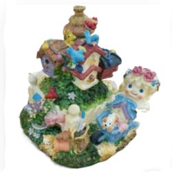 Musical Wind Up Statue "When the Red Red Robin Comes Bob Bob Bobbin Along" 
5.25"X 5 Inches Beautiful Detail Nice!
