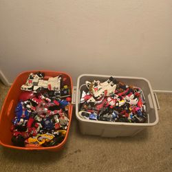 About 50lbs of power rangers in two totes