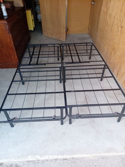 Set of metal bed frames in good condition.