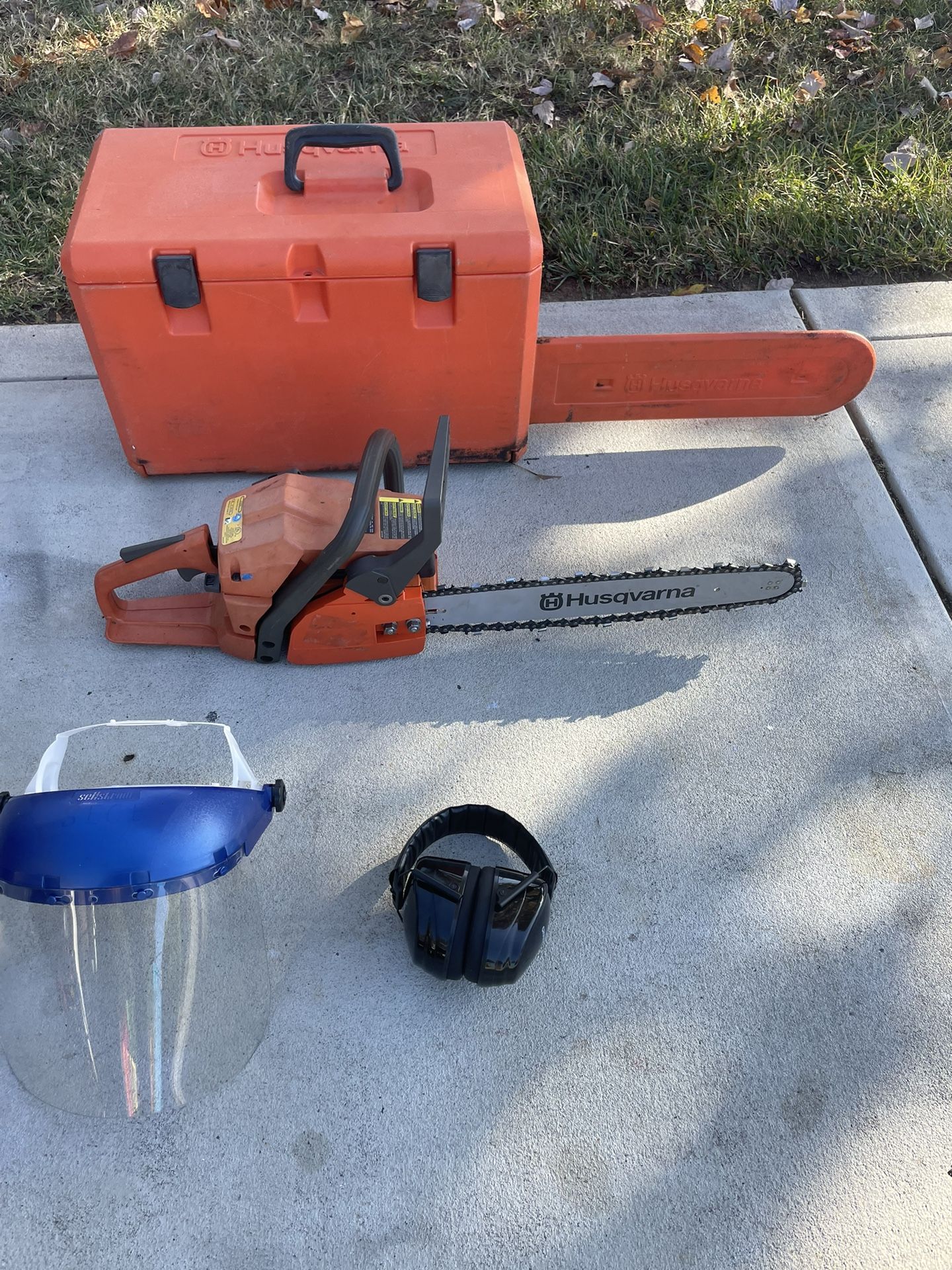 Husqvarna Chainsaw in GOOD working condition PLUS Face Protector and Noise-Canceling Headphones