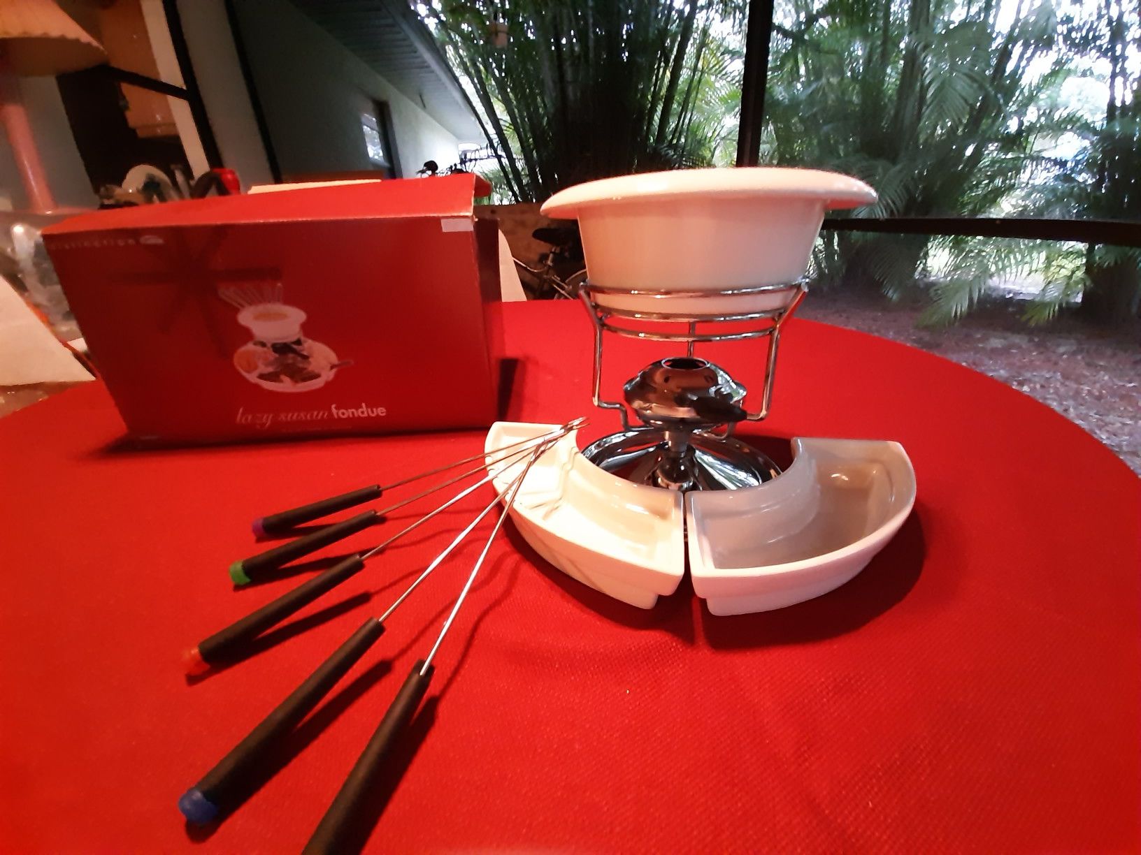Fondue warmer with side plates and forks. New