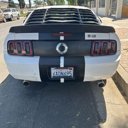 Raxiom Gen5 Tail Lights; Black Housing; Smoked Lens (05-09 Mustang) GT & Base V6