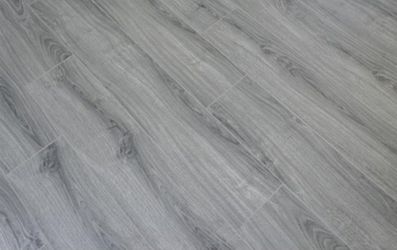 Trafford Oak 8.03-in W x 3.96-ft L Smooth Wood Plank Laminate Flooring Trafford Oak 8.03-in W x 3.96-ft L Smooth Wood Plank Laminate Flooring