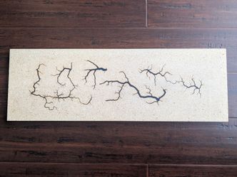 Handmade High Voltage Arc Art, made with 15,000 volts 
Dark Blue Epoxy Filled 
Dimensions 24" x 8"