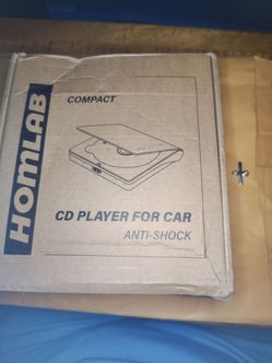 This is a Homlab compact CD player for use in a car.