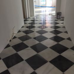 tile installations in floors and bathrooms and patios Splash