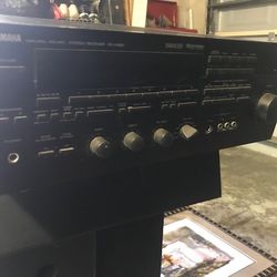 High end Amp/Receiver, 5 Speakers And Subwoofer.