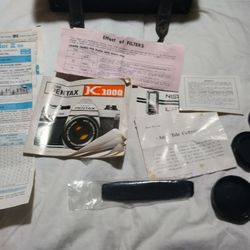 Asahi Pentax K1000 Camera With Multiple Lenses And All Paperwork