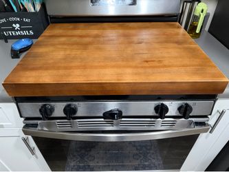 Wooden stove topper