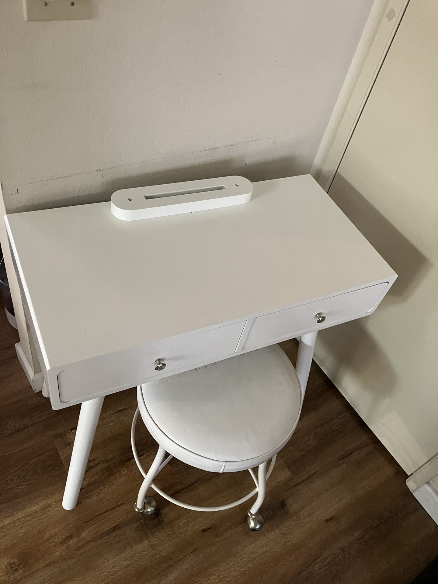 White vanity table with stool