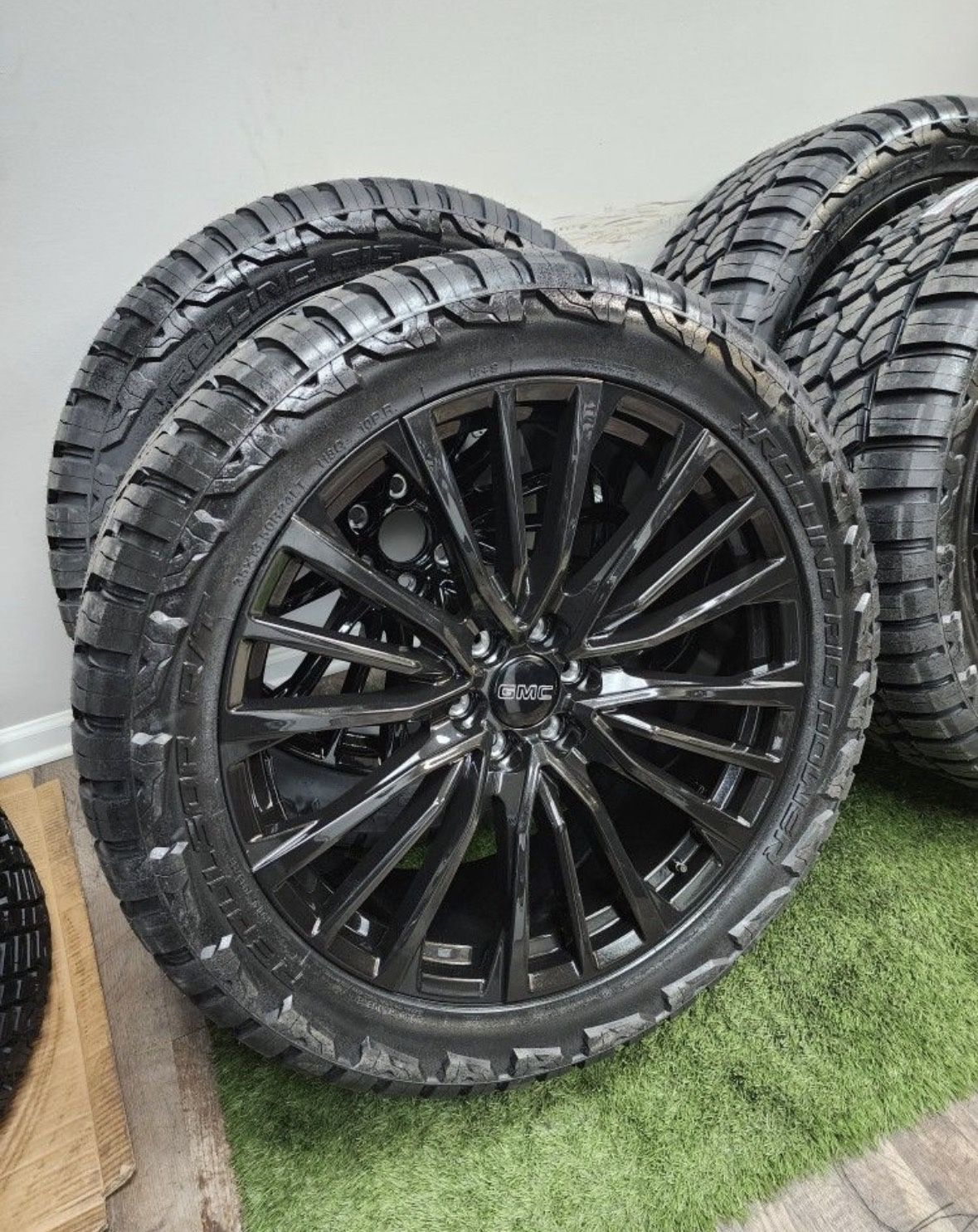 New 24 inch gloss black gm style wheels wrapped in 35x13.50R24 RBP