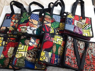 Handmade colorful lightweight African tote handbag
. Zip Closure.