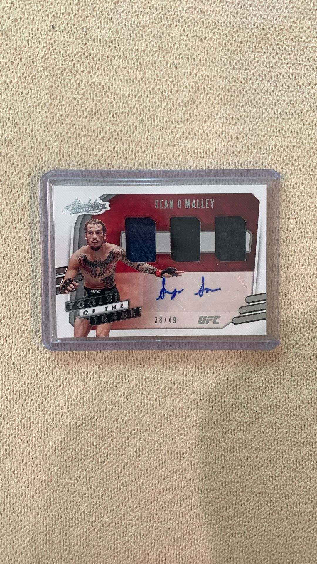 Sean O’ Malley Autographed Card, With 3 Pieces Of Fighter Worn Memorabilia, And Numbered Out Of /49 Made
