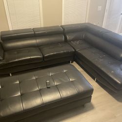 Used Black Sectional  And Ottoman 