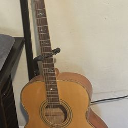 Jumbo Guitar With Stand