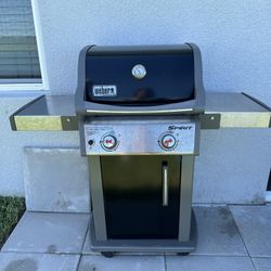 Weber Grill with 2 Propane Tanks