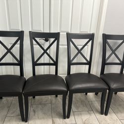 4 black chairs