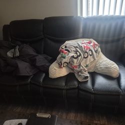 2 black reclining chairs, in normal use, good condition.