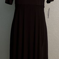 Elegant black high-low dress with short sleeves. NWT
