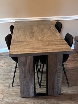 Dinner table with chairs
