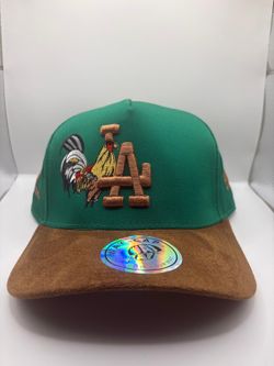 LA Rooster Hat. Brand new Hats. Cachuchas y Gorras nuevas. Western, truckers, and sports hats. Located in HESPERIA. INVENTORY 1