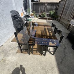 Glass table & chairs 