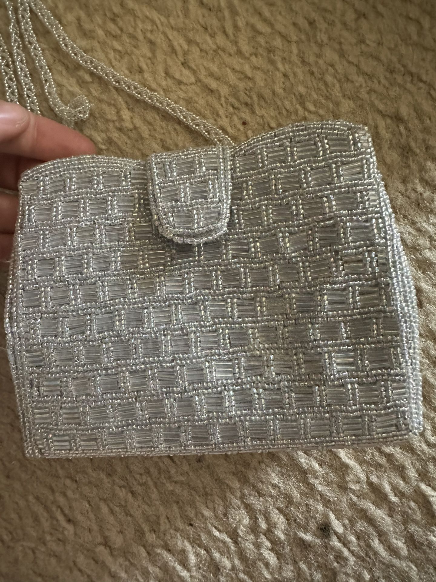 Silver sequined mini bag with long strap
