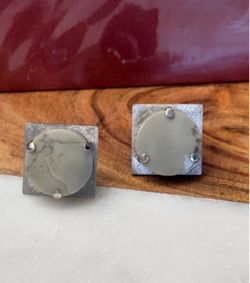 Vintage mid-century Destino cufflinks feature distinctive domed gray stones.