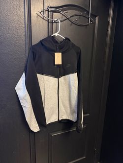Black and gray Nike tech