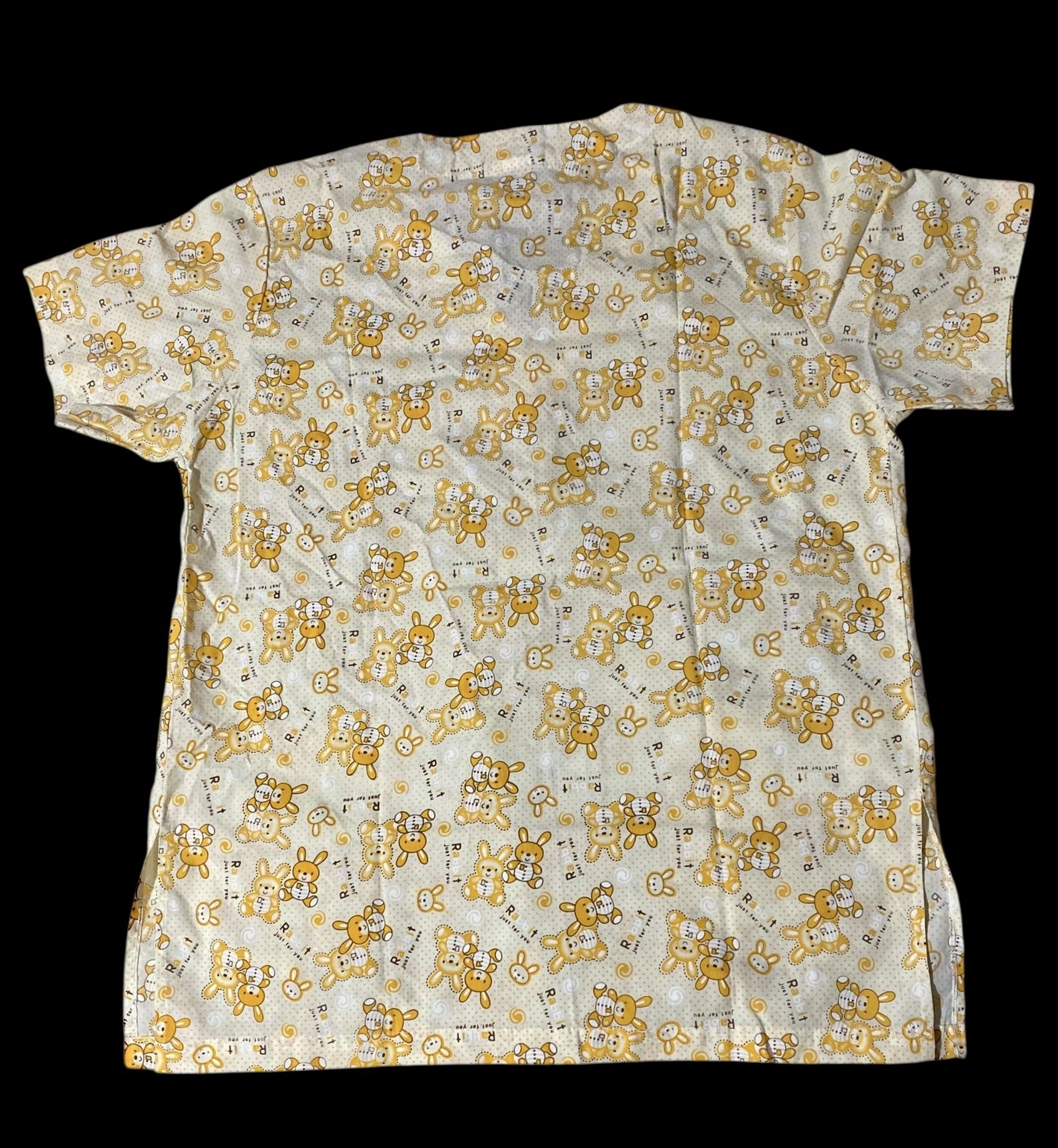Yellow and white  bunny printed scrub top with pockets & V-neck.